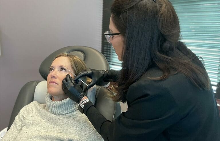 Patient receiving botox treatment